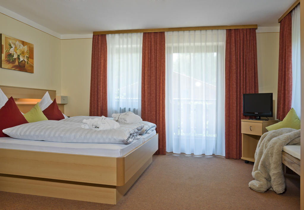 Hotel Garni Vier Jahreszeiten Бад-Фюссинг Номер фото